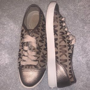 Size 9.5 women’s Michael Kors sneakers